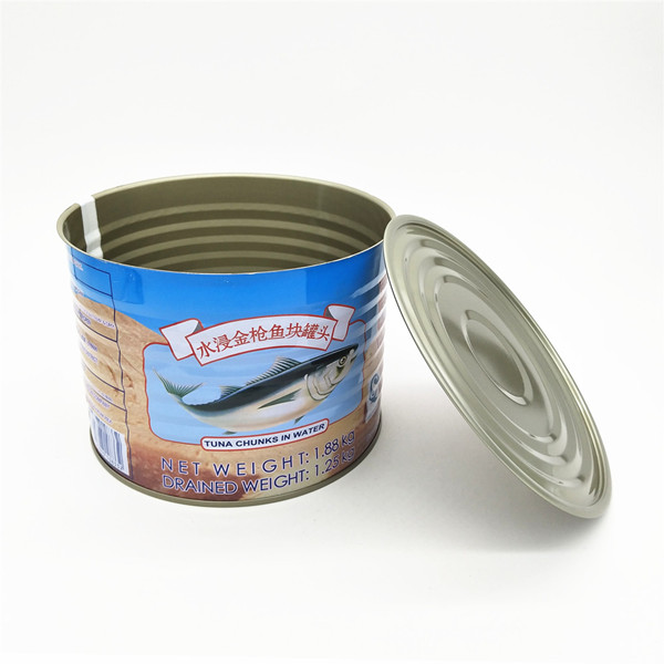 three piece round empty tuna tin cans